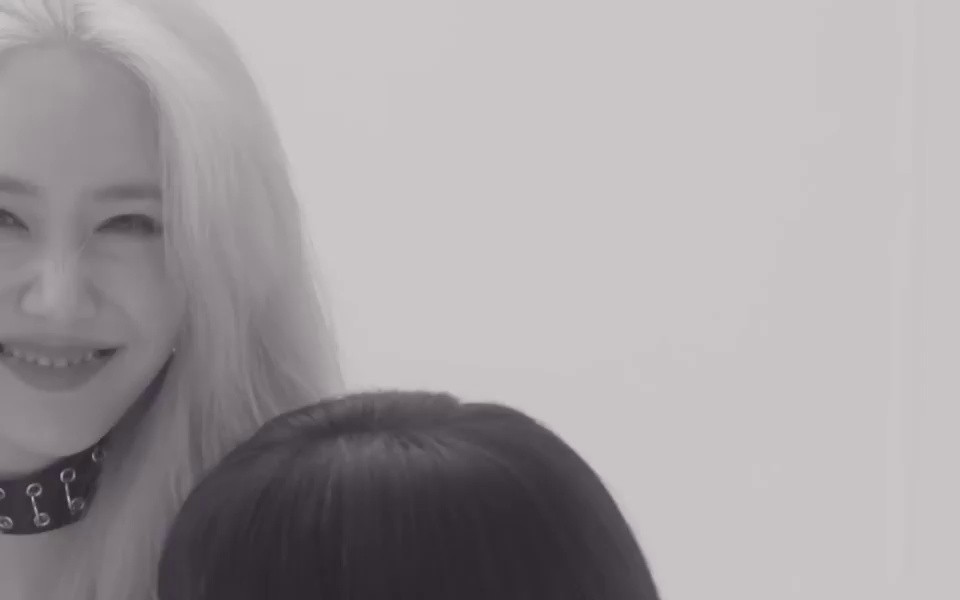 Bibi Ji Eunha's breast bone in lingerie look in the music video