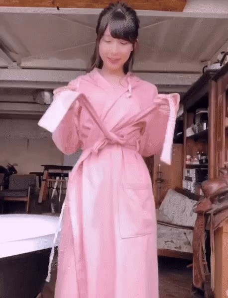 Aya Kawasaki taking off her gown