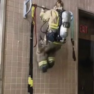 a working out firefighter gif