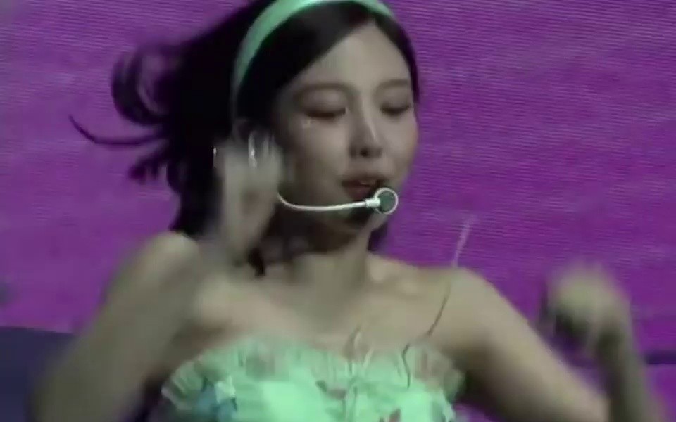 TWICE NAYEON with a mint hairband and hot pants