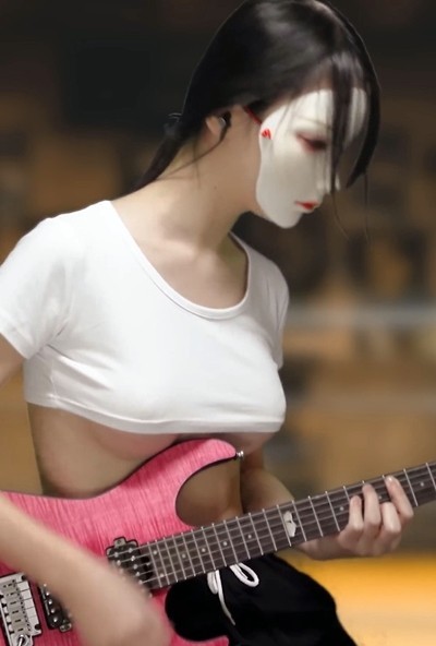 Guitarist YouTuber nacoco, a very small underbelly white t-shirt