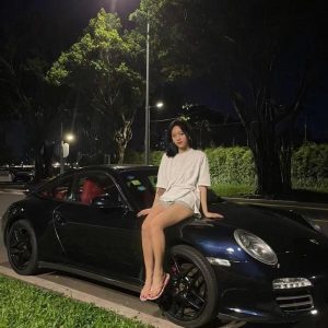 a Porsche woman