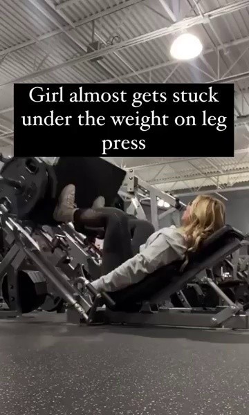 (SOUND)A woman who's tired from doing leg press