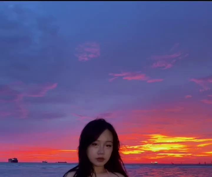 (SOUND)The beautiful red sunset on the beach
