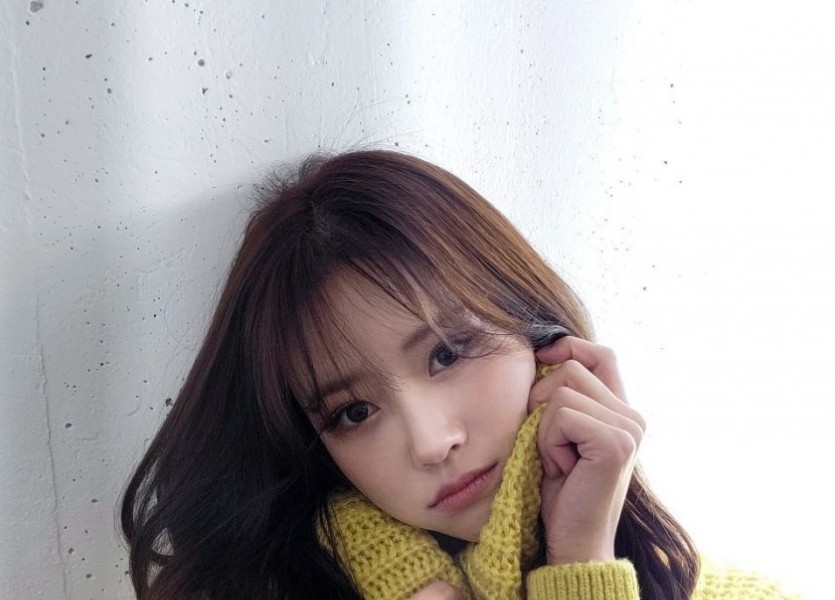 Mi-Joo's Instagram knitwear and leather skirt
