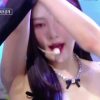 Red Velvet Joy's cleavage leaning forward