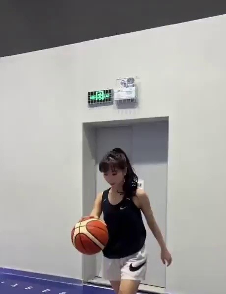 Nunna, who is good at basketball, demonstrates a layup shot