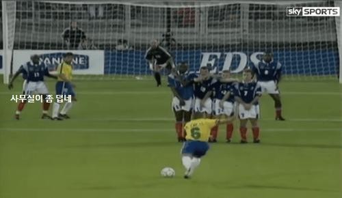 1997, the most famous free kick in history.gif