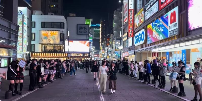 A typical Japanese city street scene at night