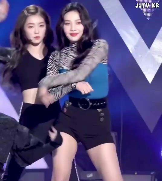 Red Velvet Joy wearing a zebra-like outfit and black hot pants