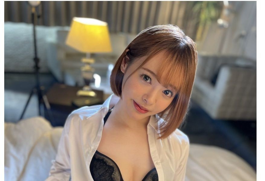 Yuna Ogura, white shirt on the bed, open button, black lace bra, wide open gums