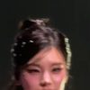 Ponytail taken slightly from below ITZY Yeji's crop top with a flowing bounce