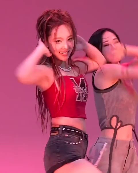 Nayeon's thighs are properly widened in red sleeveless + denim hot pants behind the scenes