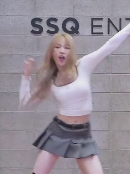 Beautiful Nana practicing choreography in a tight-fitting white tee and short skirt